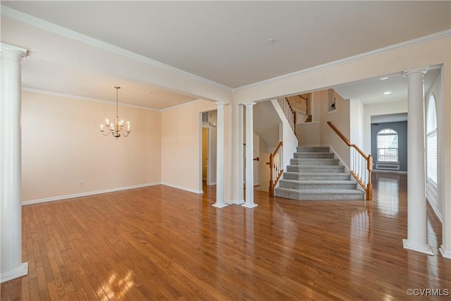 521 Siena Ln, Henrico, VA 23059 - unfurnished living room featuring decorative columns, wood finished floors, stairway, ornamental molding, and a chandelier