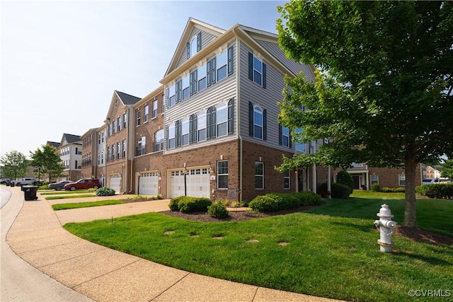 521 Siena Ln, Henrico, VA 23059 - view of building exterior featuring a garage and concrete driveway