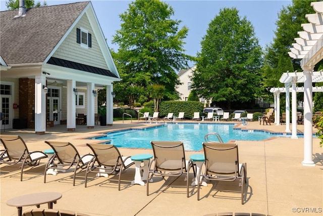 521 Siena Ln, Henrico, VA 23059 - community pool with a pergola, a patio area, an outdoor structure, and a storage structure