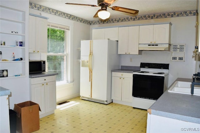 1006 N Main St, Farmville, VA 23901 - kitchen featuring electric range oven, under cabinet range hood, white fridge with ice dispenser, white cabinetry, and light flooring