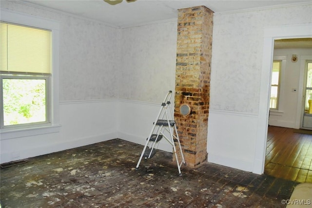 1006 N Main St, Farmville, VA 23901 - unfurnished room with healthy amount of natural light, ornamental molding, wainscoting, and hardwood / wood-style flooring