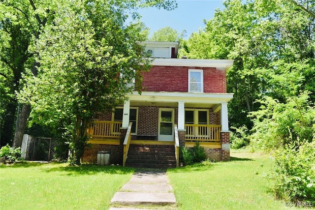 1006 N Main St, Farmville, VA 23901 - view of front of house featuring brick siding and covered porch