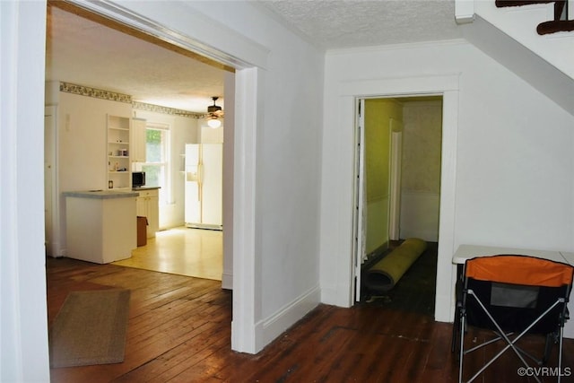 1006 N Main St, Farmville, VA 23901 - hallway with hardwood / wood-style flooring and a textured ceiling