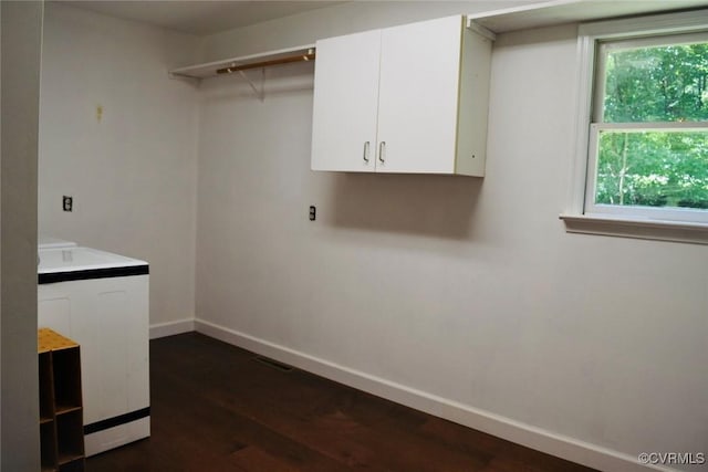 1006 N Main St, Farmville, VA 23901 - laundry room featuring dark wood-type flooring and baseboards