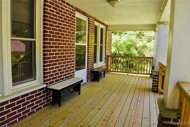 1006 N Main St, Farmville, VA 23901 - wooden terrace featuring covered porch