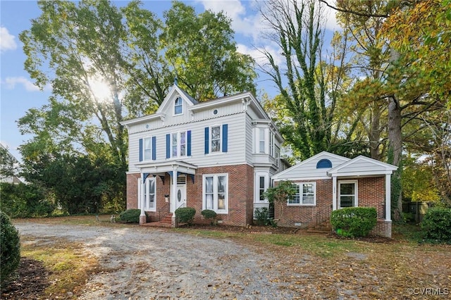 102 Market St, Onancock, VA 23417 - italianate home with brick siding and board and batten siding