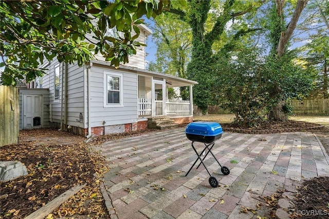 102 Market St, Onancock, VA 23417 - view of patio with covered porch, grilling area, and fence