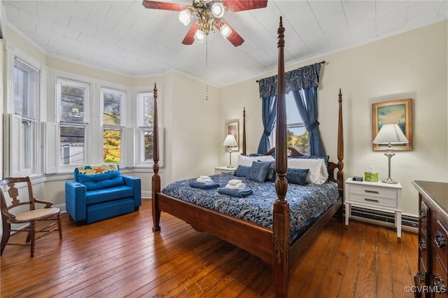 102 Market St, Onancock, VA 23417 - bedroom featuring crown molding, wood-type flooring, and a ceiling fan