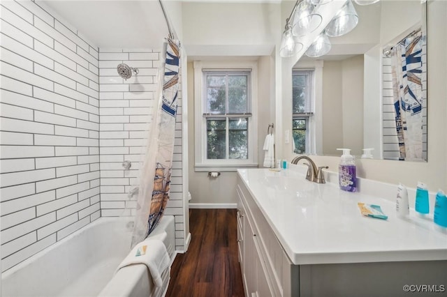 102 Market St, Onancock, VA 23417 - full bath with wood finished floors, vanity, and shower / bathtub combination with curtain