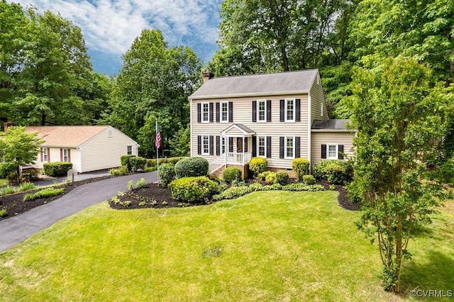 4800 Ball Cypress Rd, Chesterfield, VA 23832 - colonial inspired home featuring a chimney and a front lawn