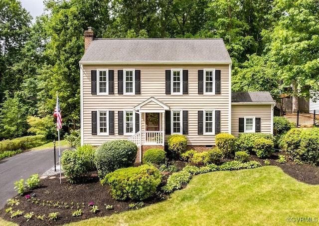 4800 Ball Cypress Rd, Chesterfield, VA 23832 - colonial home with a chimney and a shingled roof