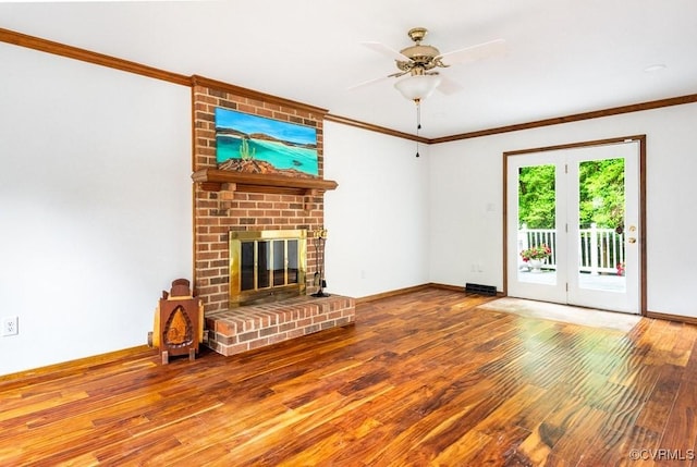 4800 Ball Cypress Rd, Chesterfield, VA 23832 - unfurnished living room featuring wood-type flooring, crown molding, a ceiling fan, a fireplace, and baseboards
