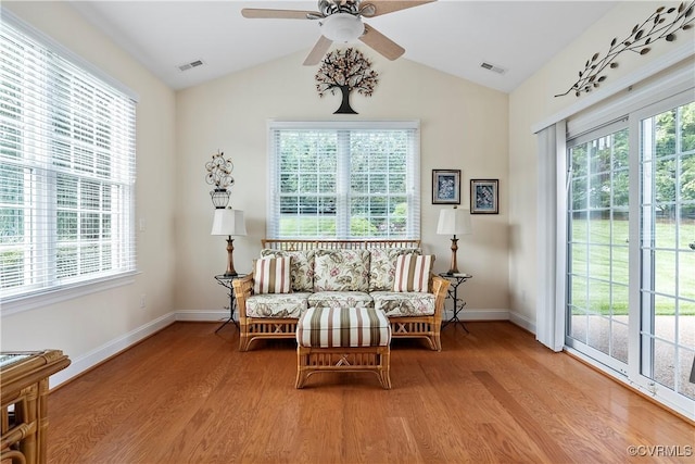 9428 Berry Patch Ln, Mechanicsville, VA 23116 - living area with wood finished floors, baseboards, lofted ceiling, and a ceiling fan