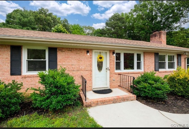 5401 Carteret Rd, Chesterfield, VA 23832 - entrance to property featuring brick siding and a chimney