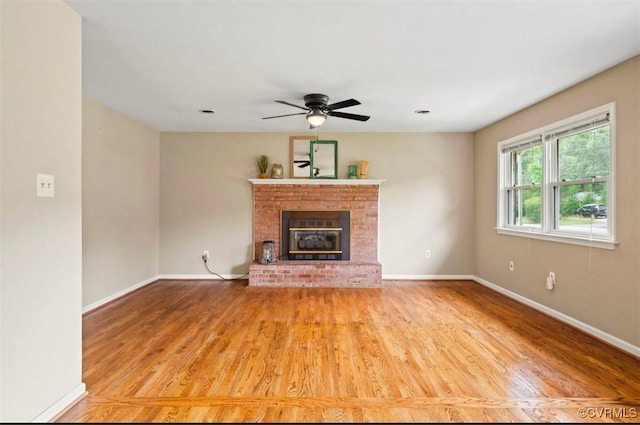 5401 Carteret Rd, Chesterfield, VA 23832 - unfurnished living room featuring baseboards, wood finished floors, and a fireplace