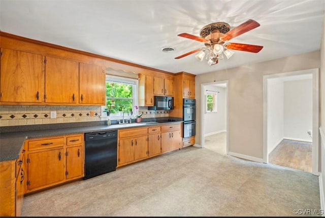 5401 Carteret Rd, Chesterfield, VA 23832 - kitchen featuring black appliances, tasteful backsplash, a ceiling fan, a sink, and brown cabinetry