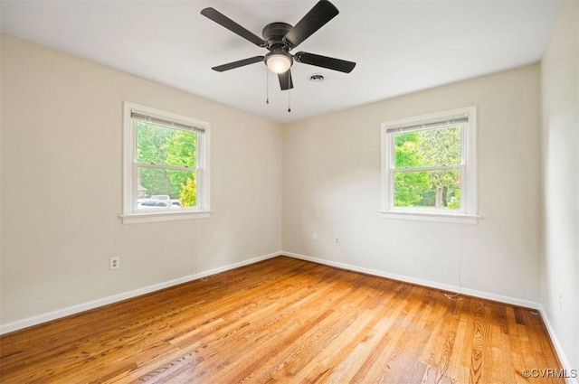 5401 Carteret Rd, Chesterfield, VA 23832 - unfurnished room featuring plenty of natural light, baseboards, and wood finished floors