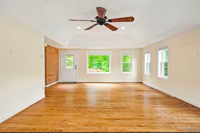 5401 Carteret Rd, Chesterfield, VA 23832 - spare room featuring plenty of natural light, a tray ceiling, light wood-style floors, ceiling fan, and recessed lighting