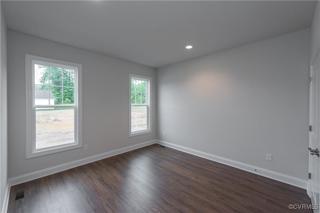 12540 N Readers Ln, Manakin Sabot, VA 23103 - empty room with healthy amount of natural light, baseboards, dark wood-style flooring, and recessed lighting