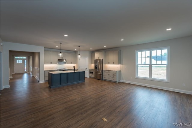 12540 N Readers Ln, Manakin Sabot, VA 23103 - kitchen featuring stainless steel fridge with ice dispenser, a sink, dark wood-type flooring, plenty of natural light, and recessed lighting
