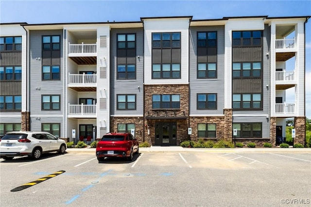 3700 Maze Runner Dr Unit 204, Midlothian, VA 23112 - view of building exterior featuring uncovered parking
