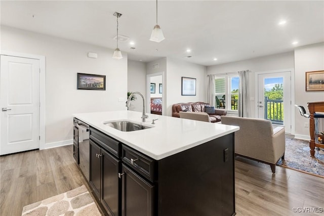 3700 Maze Runner Dr Unit 204, Midlothian, VA 23112 - kitchen featuring a sink, light wood-style flooring, light countertops, recessed lighting, and open floor plan