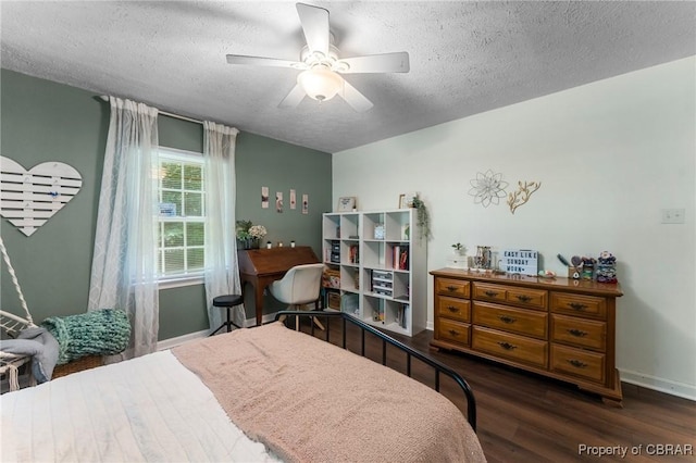 542 Cod Creek Dr, Heathsville, VA 22473 - bedroom with a textured ceiling, wood finished floors, baseboards, and a ceiling fan
