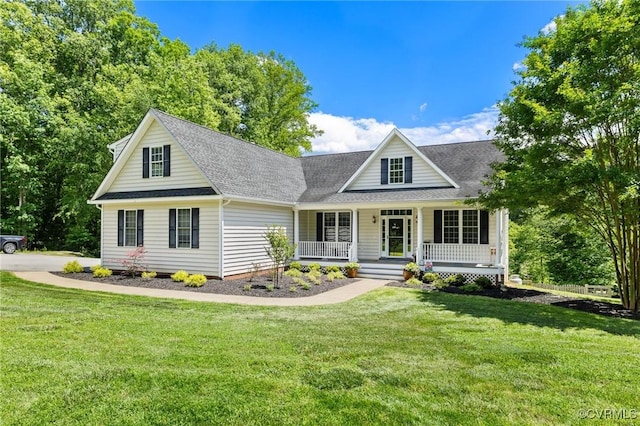 1629 Olmstead Dr, Powhatan, VA 23139 - view of front of house with covered porch, a shingled roof, and a front lawn