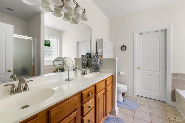 1629 Olmstead Dr, Powhatan, VA 23139 - full bathroom with double vanity, a bath, toilet, a shower stall, and tile patterned floors
