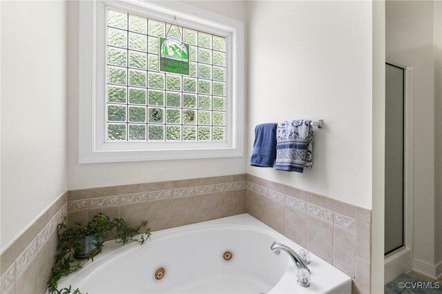 1629 Olmstead Dr, Powhatan, VA 23139 - bathroom featuring a jetted tub and a stall shower