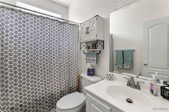 1629 Olmstead Dr, Powhatan, VA 23139 - full bathroom with toilet, vanity, and a shower with shower curtain
