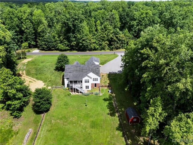 1629 Olmstead Dr, Powhatan, VA 23139 - aerial view of property and surrounding area featuring a heavily wooded area