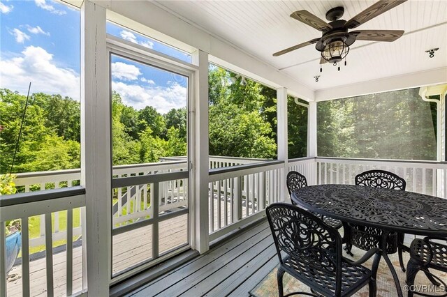 1629 Olmstead Dr, Powhatan, VA 23139 - sunroom / solarium featuring a ceiling fan, outdoor dining space, and view of scattered trees