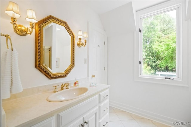 9001 Forest Ridge Ct, Henrico, VA 23229 - bathroom featuring healthy amount of natural light, vanity, tile patterned flooring, and baseboards
