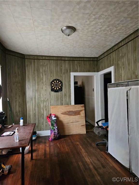 302 N High St, Blackstone, VA 23824 - office space featuring wood finished floors and wooden walls