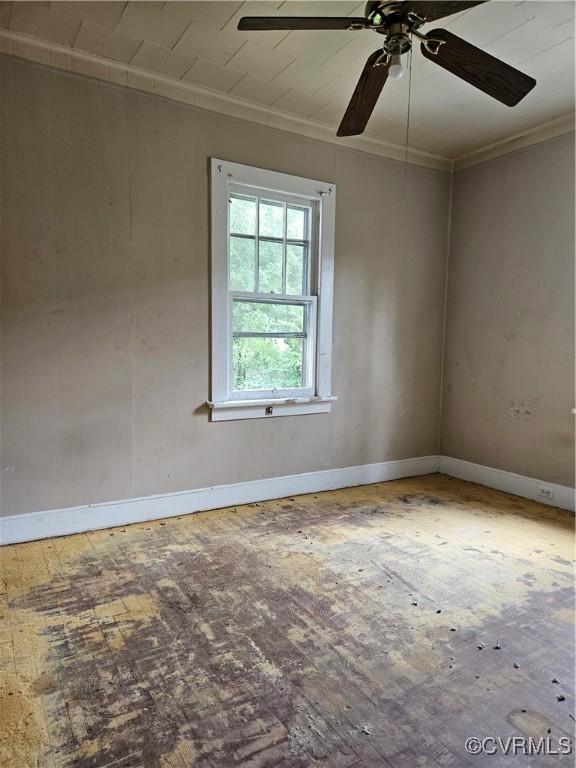 302 N High St, Blackstone, VA 23824 - empty room featuring ornamental molding and ceiling fan