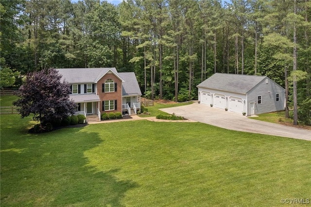 2554 Walkers Ridge Ter, Powhatan, VA 23139 - colonial-style house featuring a garage, an outbuilding, covered porch, and a front lawn