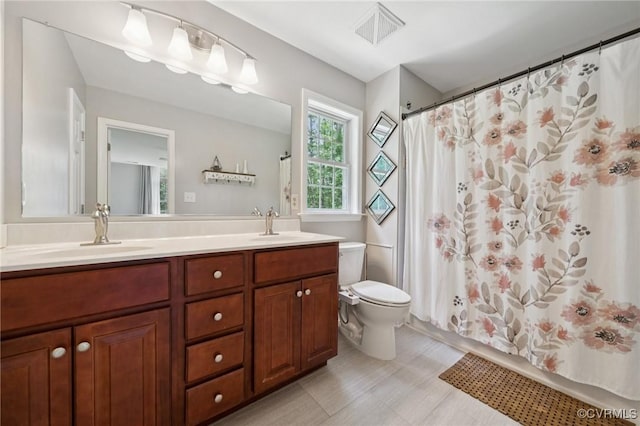 2554 Walkers Ridge Ter, Powhatan, VA 23139 - full bath featuring double vanity, toilet, and tile patterned floors