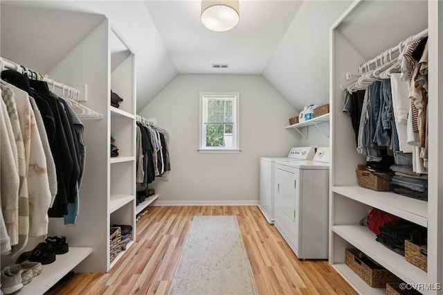 2554 Walkers Ridge Ter, Powhatan, VA 23139 - laundry room featuring washing machine and dryer, light wood-type flooring, and baseboards
