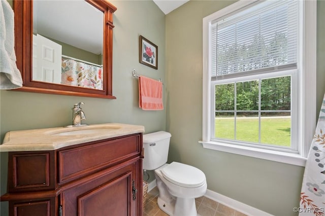 2554 Walkers Ridge Ter, Powhatan, VA 23139 - bathroom with vanity, toilet, and baseboards