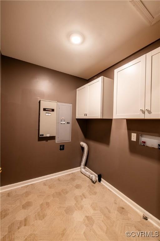 1396 Gray Fox Rd, Goochland, VA 23103 - washroom featuring cabinet space, baseboards, washer hookup, and electric panel