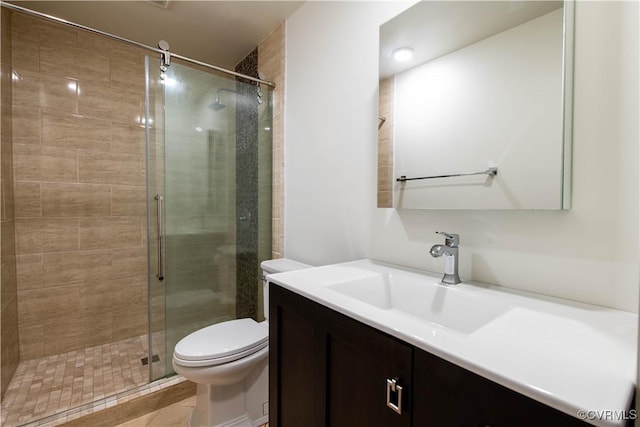 1396 Gray Fox Rd, Goochland, VA 23103 - full bathroom featuring a shower stall, toilet, vanity, and tile patterned flooring