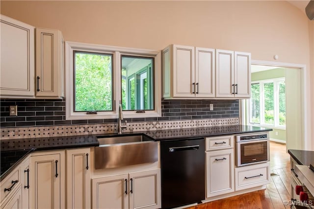 1396 Gray Fox Rd, Goochland, VA 23103 - kitchen with dishwasher, a sink, dark countertops, and stainless steel oven