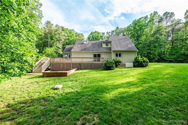 1396 Gray Fox Rd, Goochland, VA 23103 - back of property with a deck, stairs, and a yard