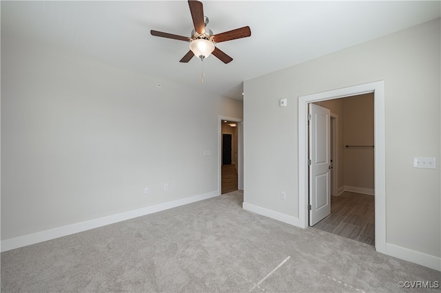 10530 Stony Bluff Dr Unit 305, Ashland, VA 23005 - unfurnished bedroom featuring carpet, baseboards, and ceiling fan