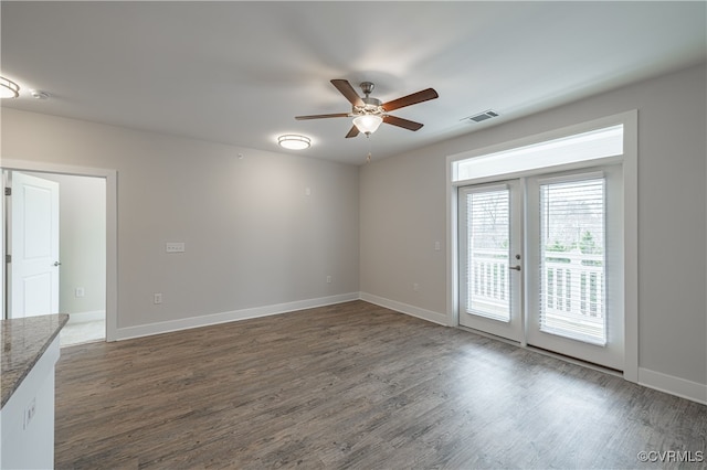 10530 Stony Bluff Dr Unit 305, Ashland, VA 23005 - empty room with french doors, a ceiling fan, wood finished floors, and baseboards