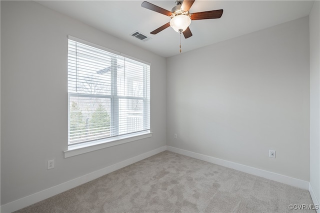 10530 Stony Bluff Dr Unit 305, Ashland, VA 23005 - unfurnished room featuring healthy amount of natural light, light colored carpet, ceiling fan, and baseboards