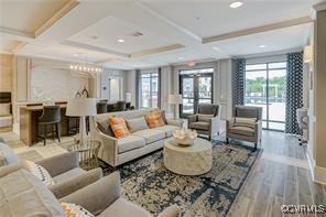 10530 Stony Bluff Dr Unit 305, Ashland, VA 23005 - living area featuring coffered ceiling, wood finished floors, beamed ceiling, and recessed lighting