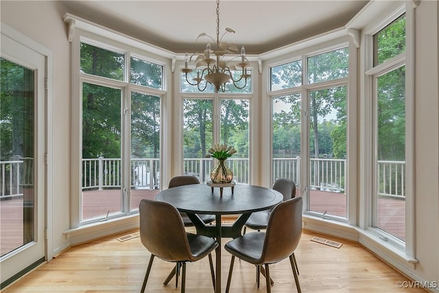 8831 Whistling Swan Rd, Chesterfield, VA 23838 - dining space featuring a chandelier and light wood-style floors