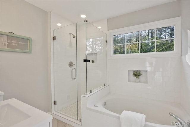 11202 Heathstead Rd, Chester, VA 23831 - bathroom with a shower stall, a bath, and vanity